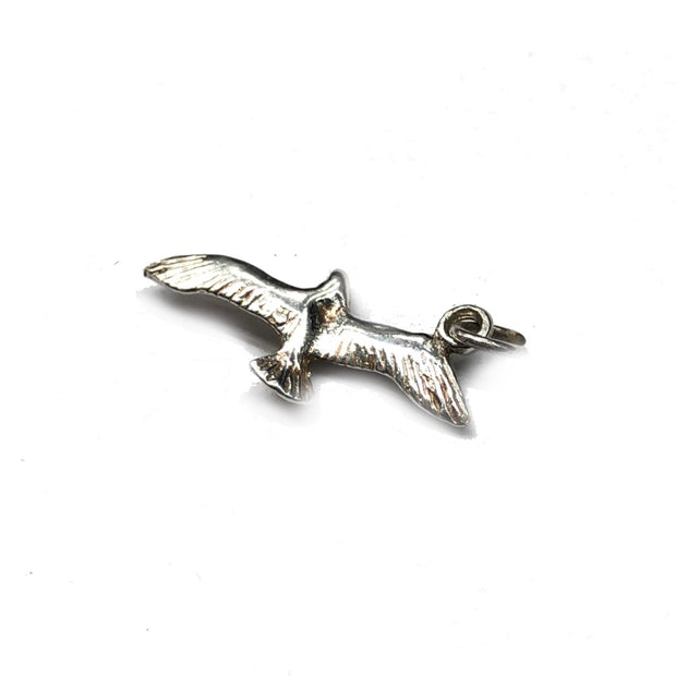 Flying bird pendant